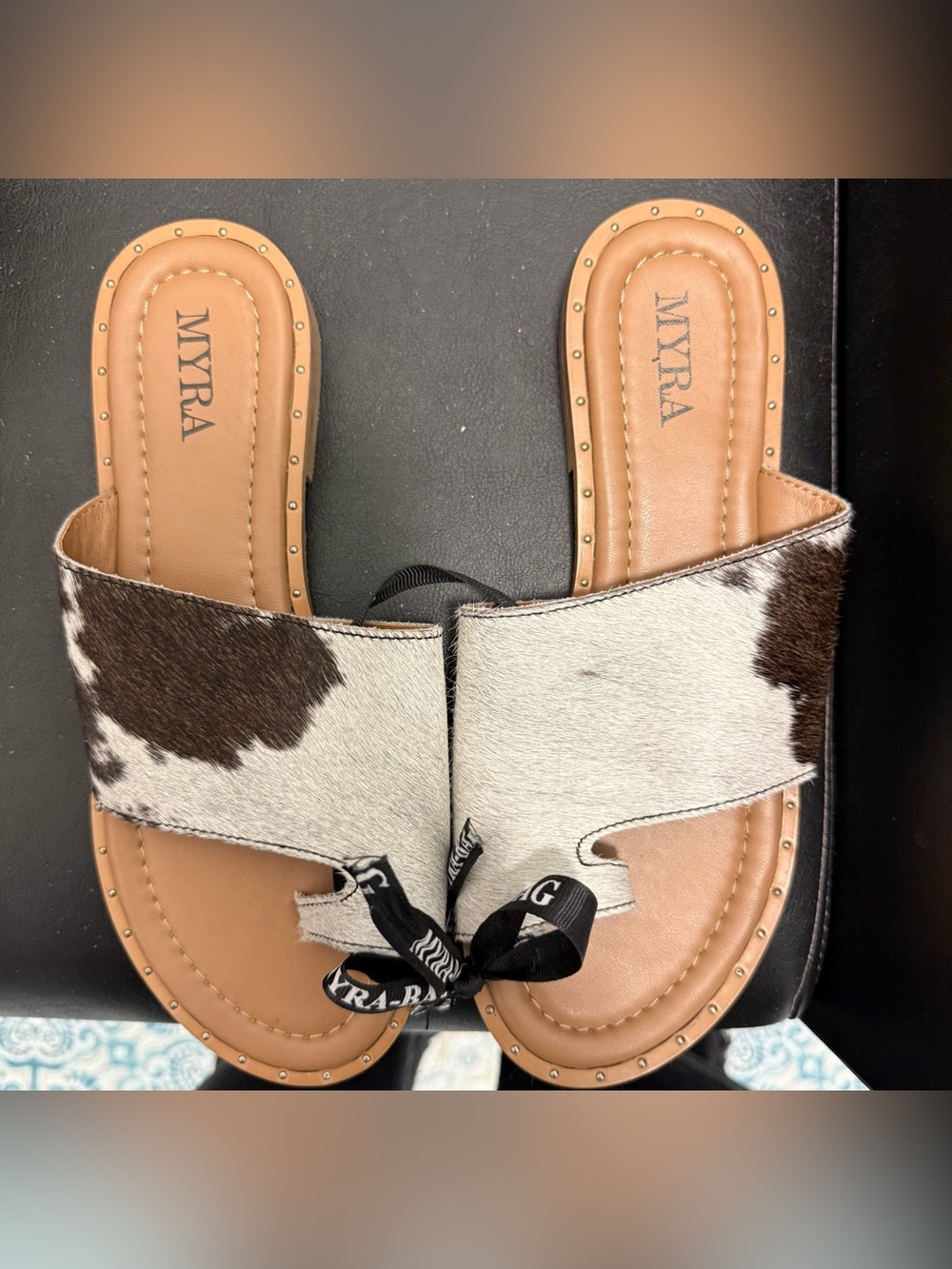 Myra Bag Tan and White Cowhide Slide Mules with Brown Spots